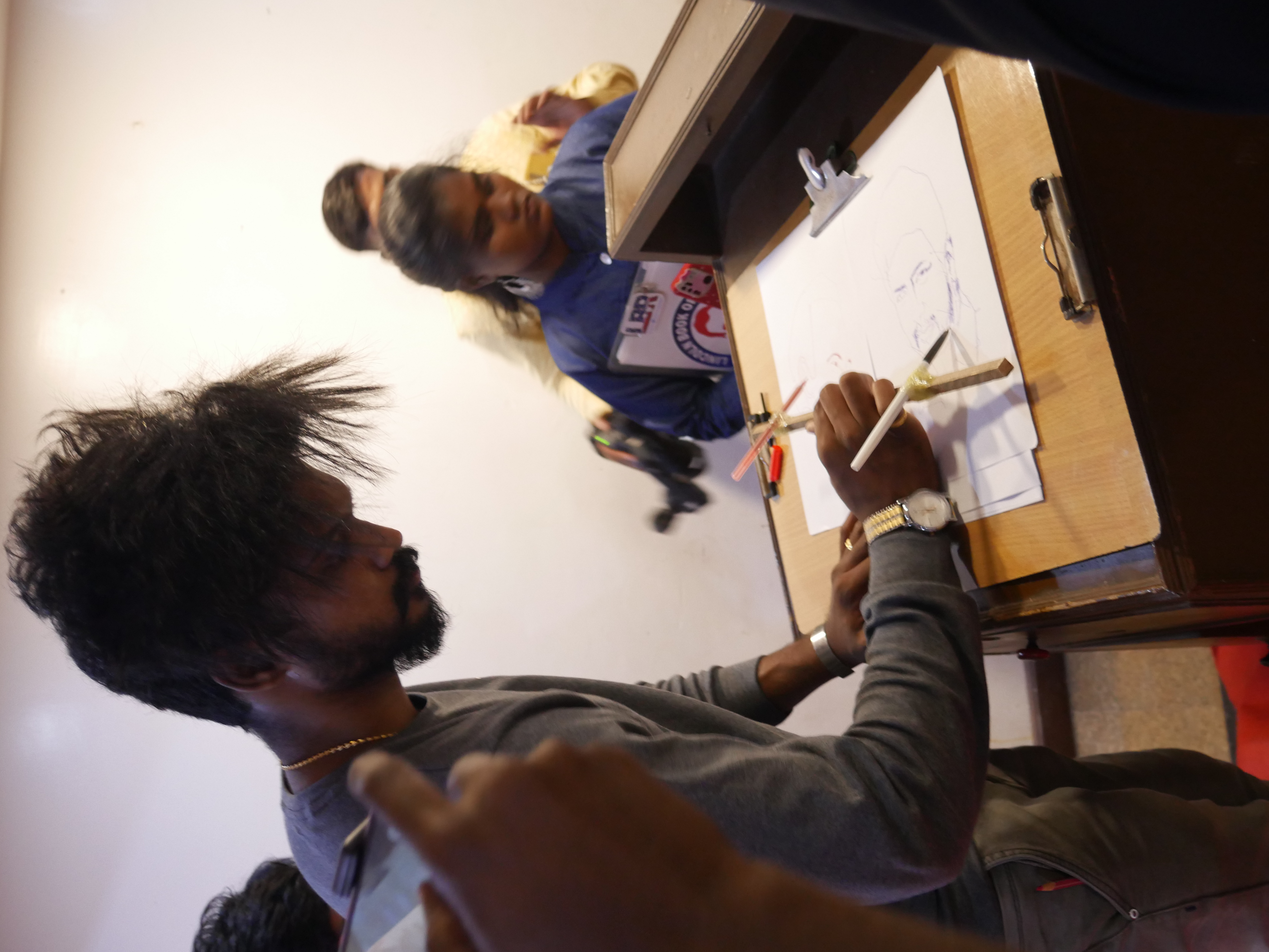 World record for drawing 2 Arts in  10 minutes with two pencils in one hand.