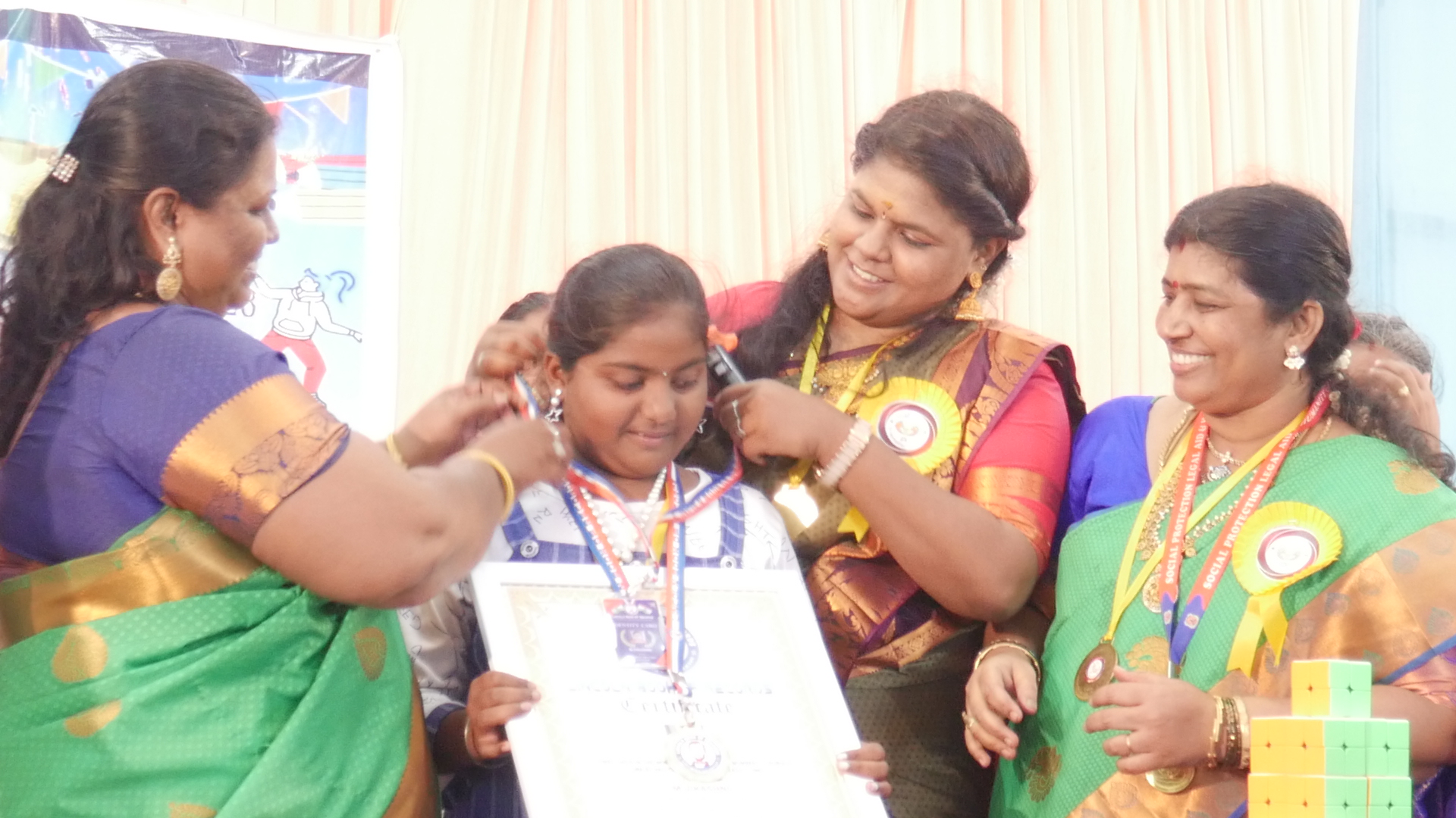 "First child in the world to solve highest number 2*2 Rubik's  Cube by reciting Thirukural in least time "