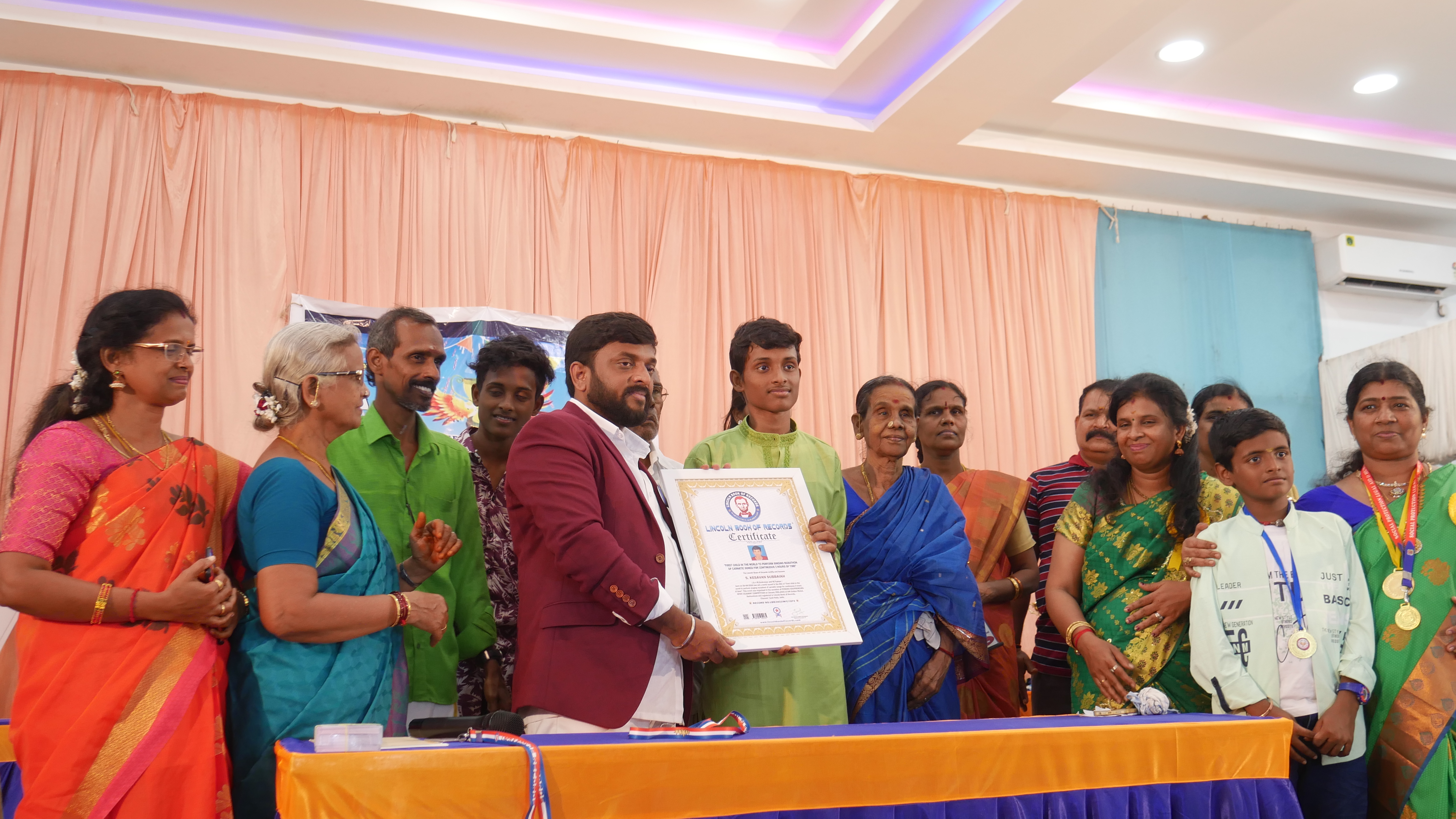 "First child in the world to perform singing marathon  of carnatic songs for continuous 3 hours of time"