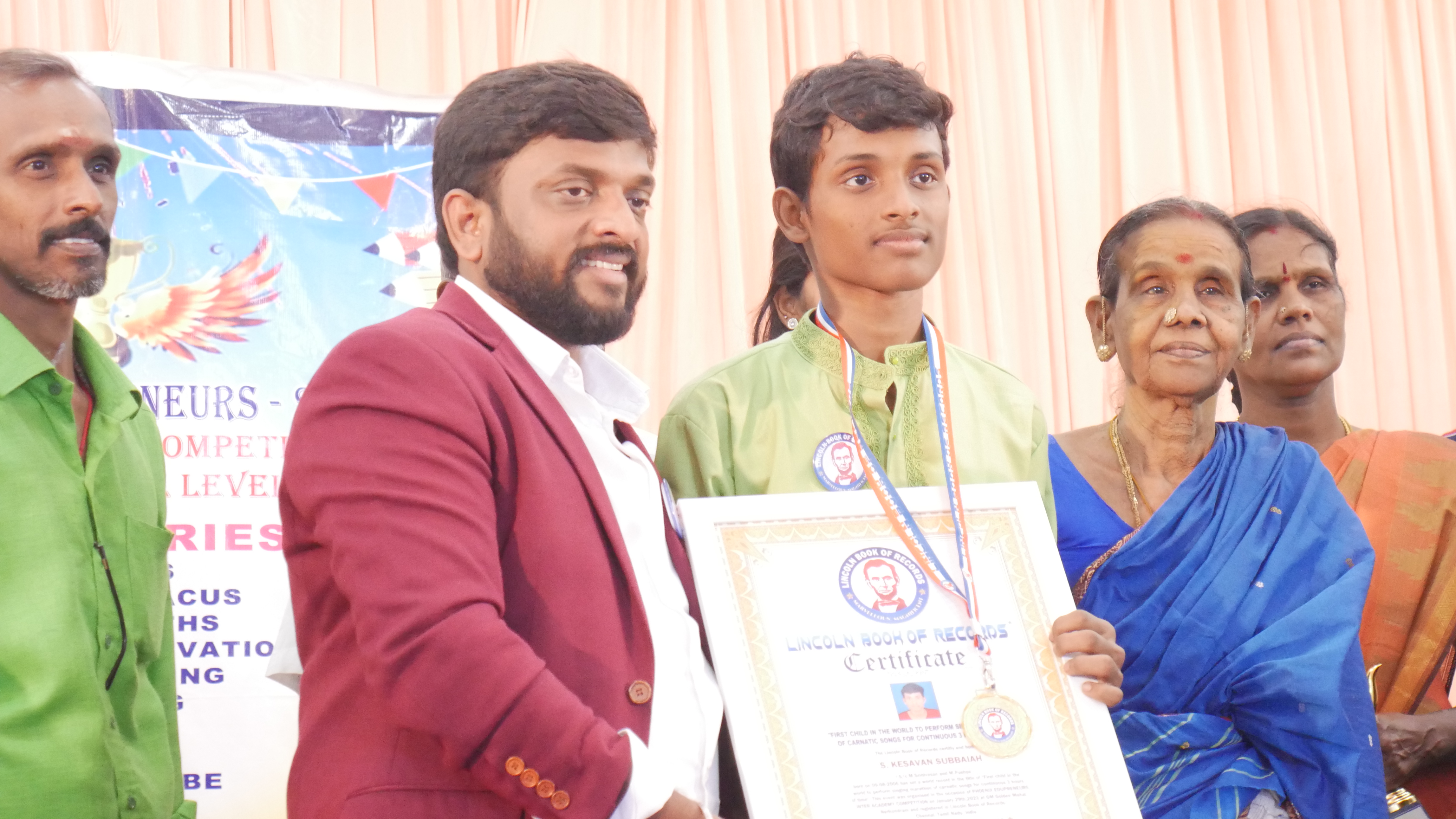 "First child in the world to perform singing marathon  of carnatic songs for continuous 3 hours of time"