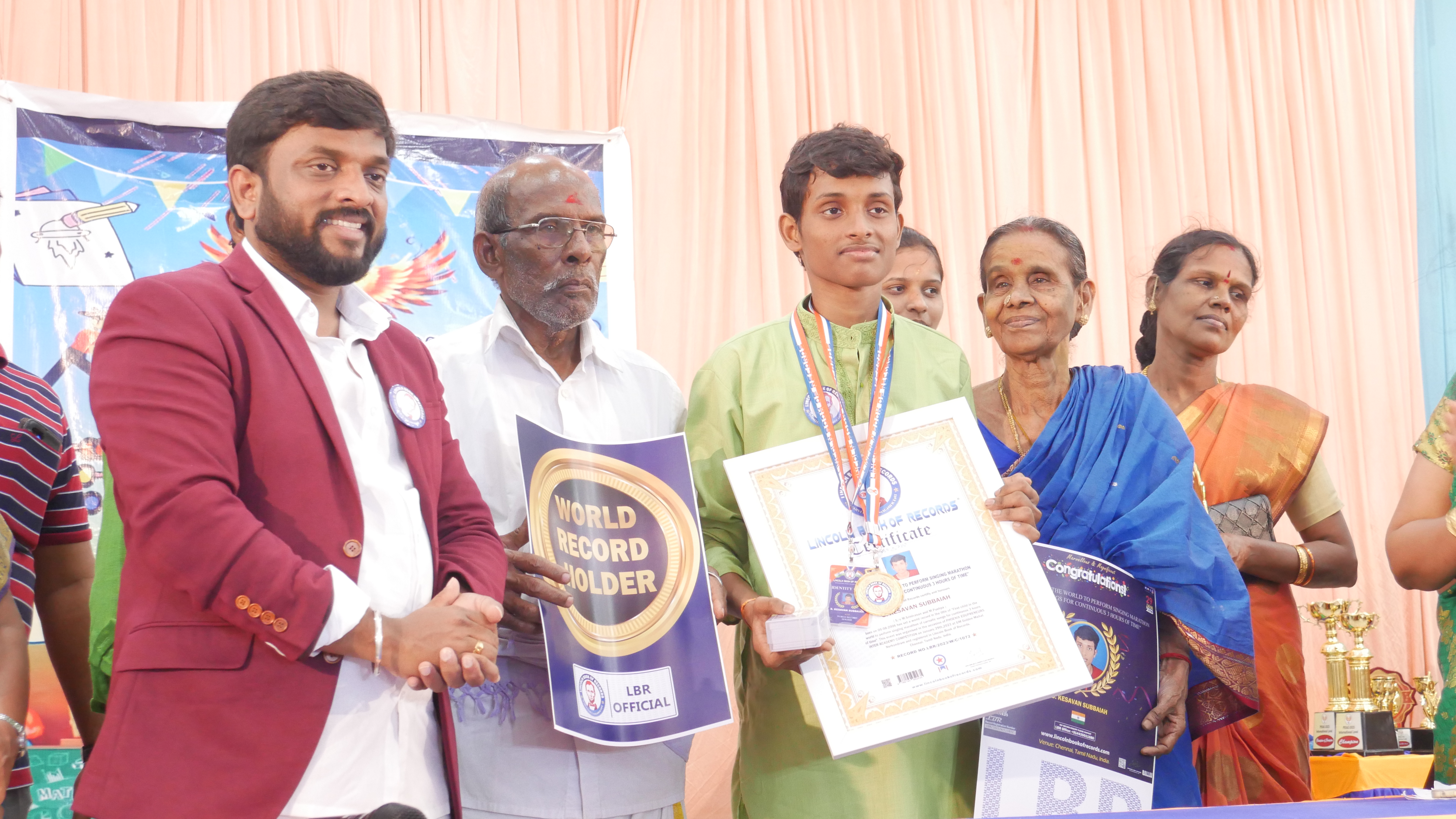 "First child in the world to perform singing marathon  of carnatic songs for continuous 3 hours of time"