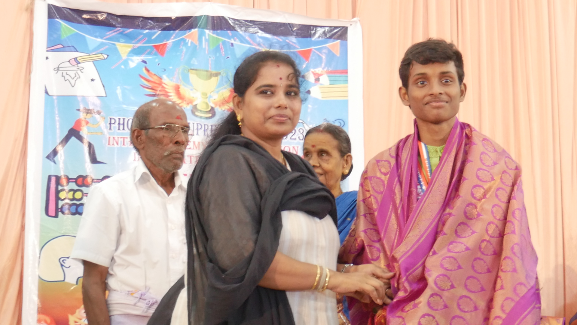 "First child in the world to perform singing marathon  of carnatic songs for continuous 3 hours of time"