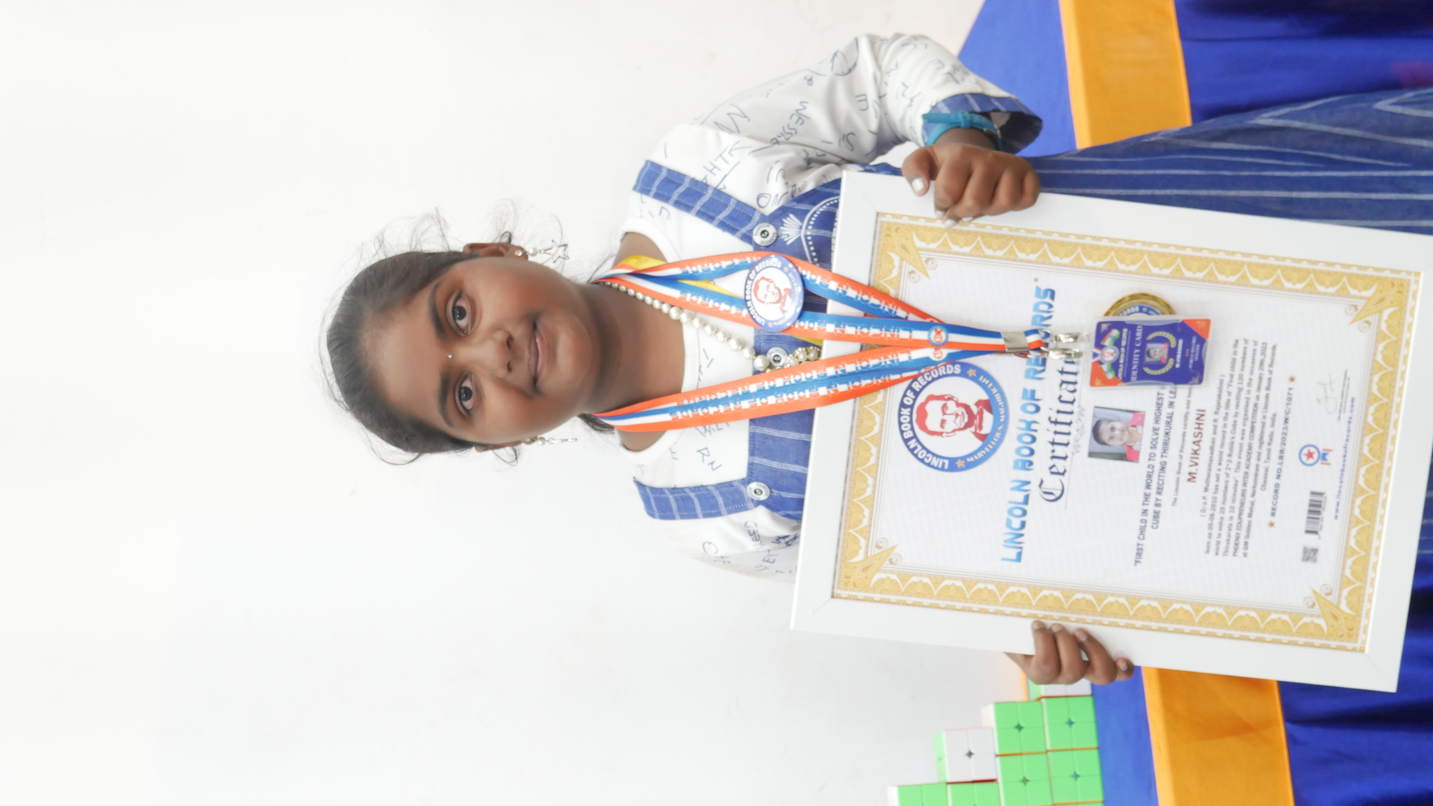 "First child in the world to solve highest number 2*2 Rubik's  Cube by reciting Thirukural in least time "