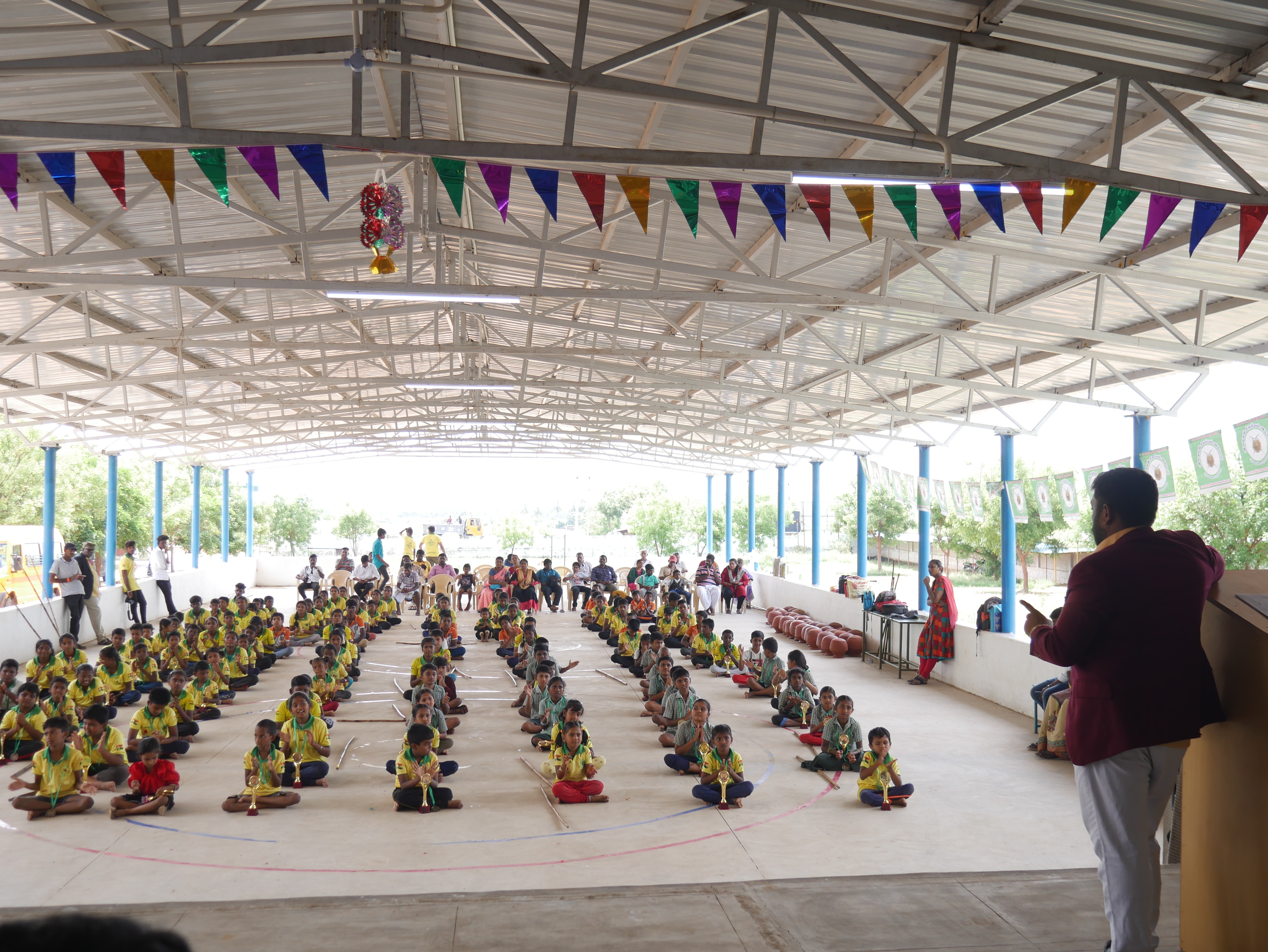 World record performance of 30 minutes Silambam  circling in Padmasana yogasan posture on mud pot.