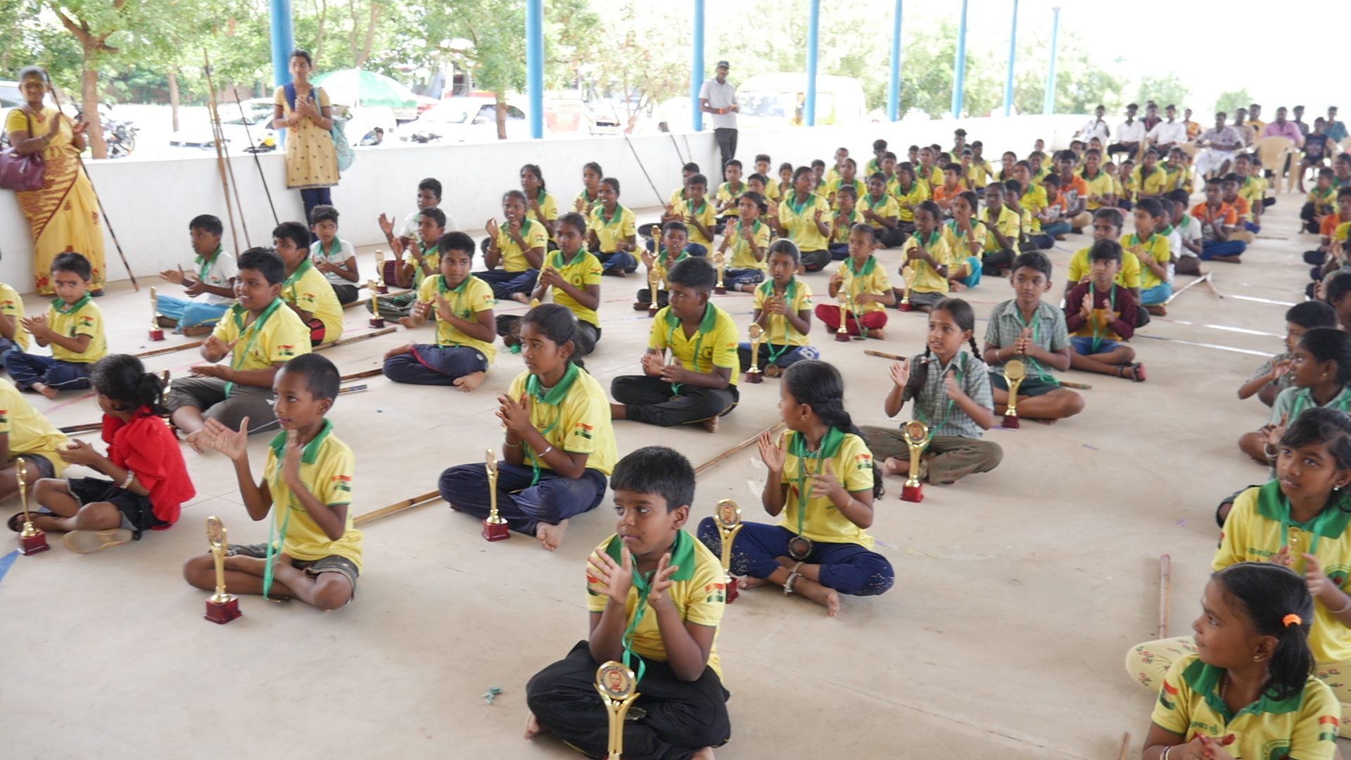 World record performance of 30 minutes Silambam  circling in Padmasana yogasan posture on mud pot.