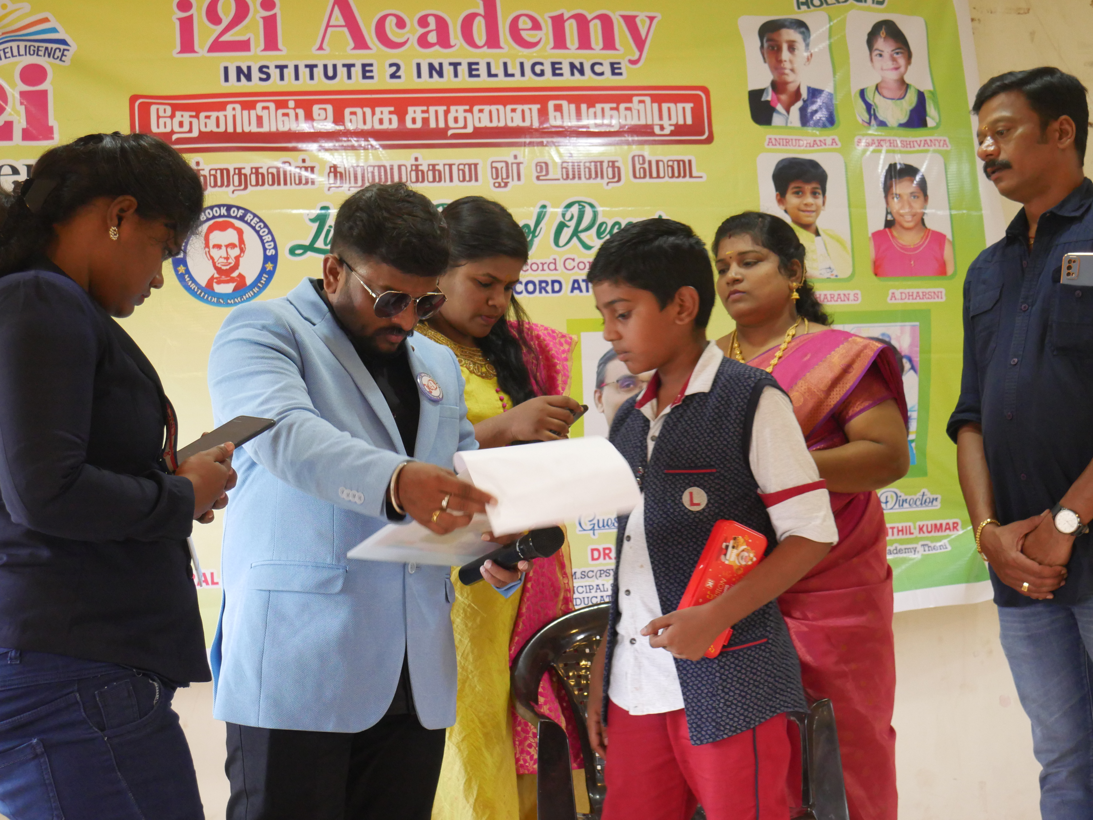 World's youngest child to trace spiral drawing of Thiruvalluvar  by reciting 1330 Thirukural simultaneously in least time.