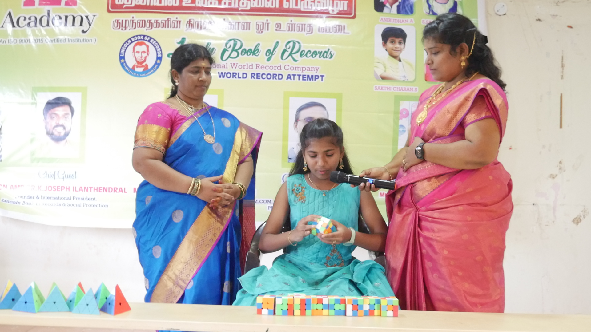 World's youngest child to solve multiple number of 3*3 Rubik's Cube  by solving maximum number of arithmetic sums using ABACUS  mental arithmetic method simultaneously in 08 minutes.