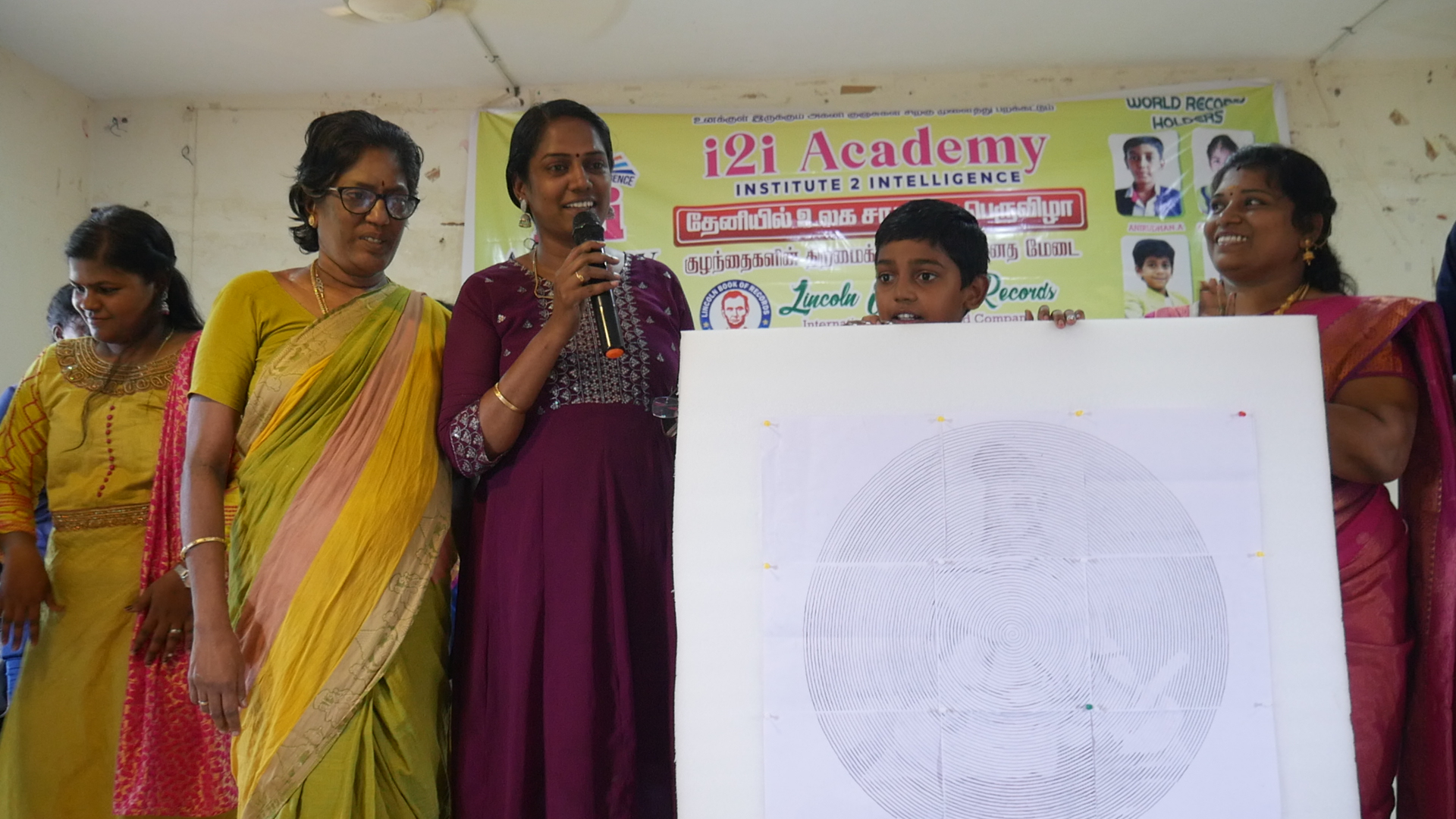 World's youngest child to trace spiral drawing of Thiruvalluvar  by reciting 1330 Thirukural simultaneously in least time.