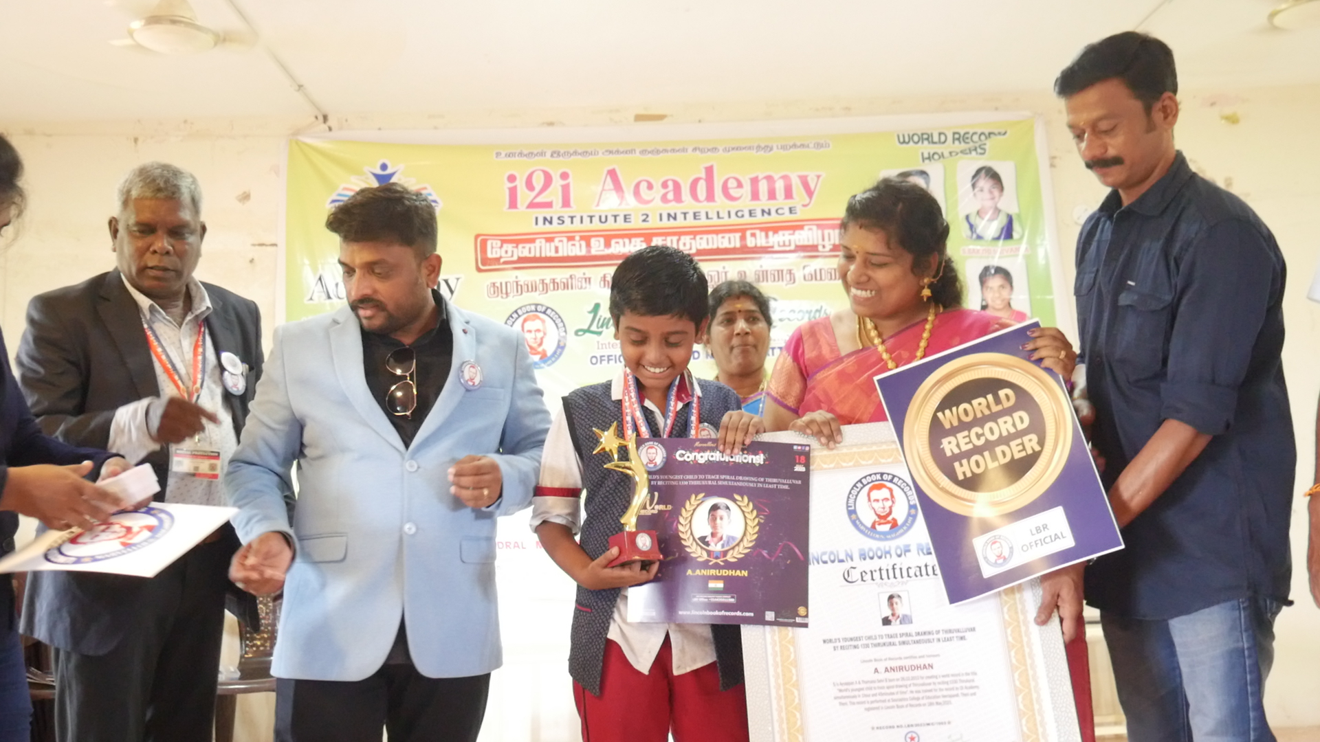 World's youngest child to trace spiral drawing of Thiruvalluvar  by reciting 1330 Thirukural simultaneously in least time.