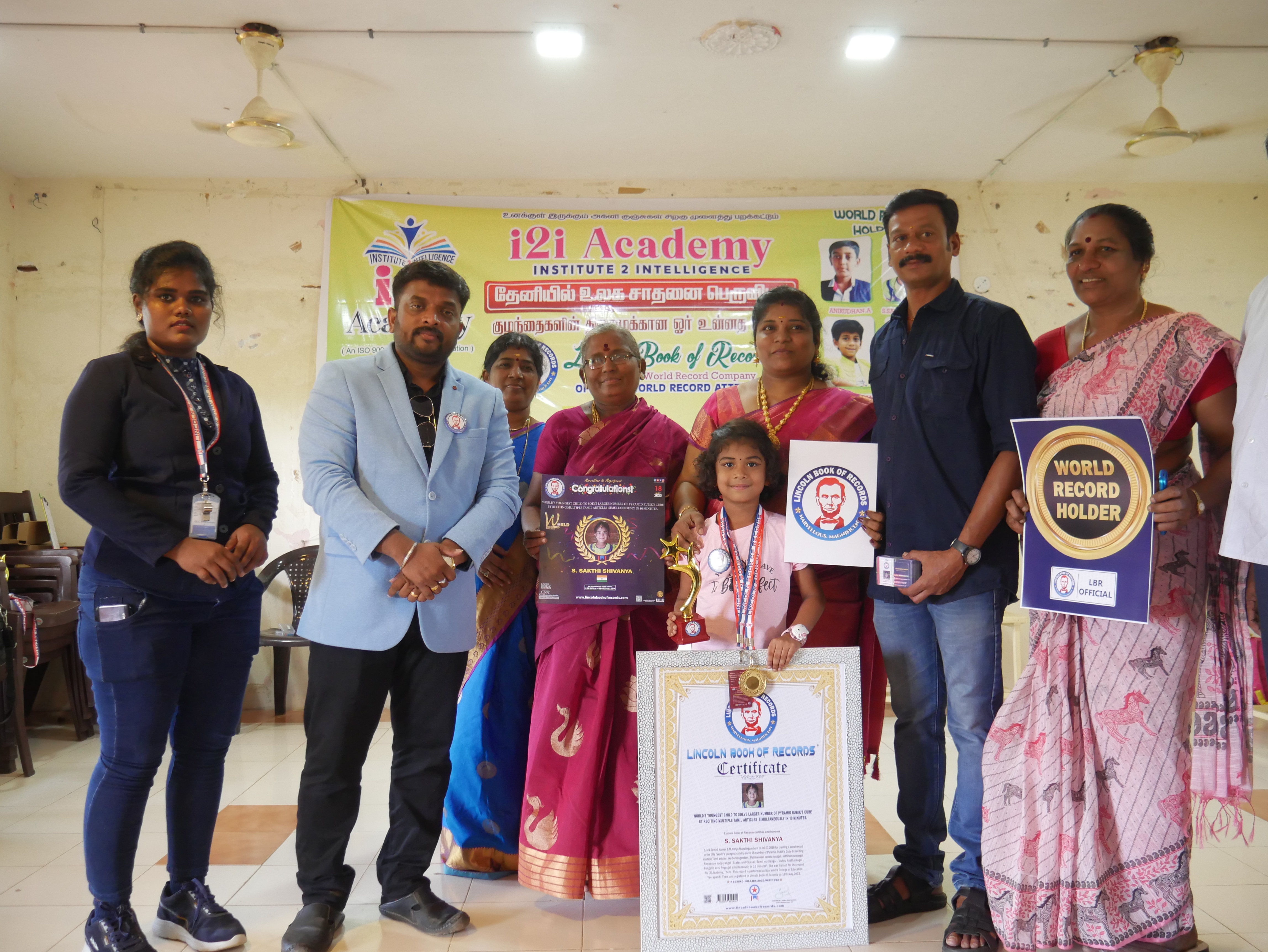 World's youngest child to solve larger number of Pyramid Rubik's Cube  by reciting multiple Tamil articles  simultaneously in 06 minutes.