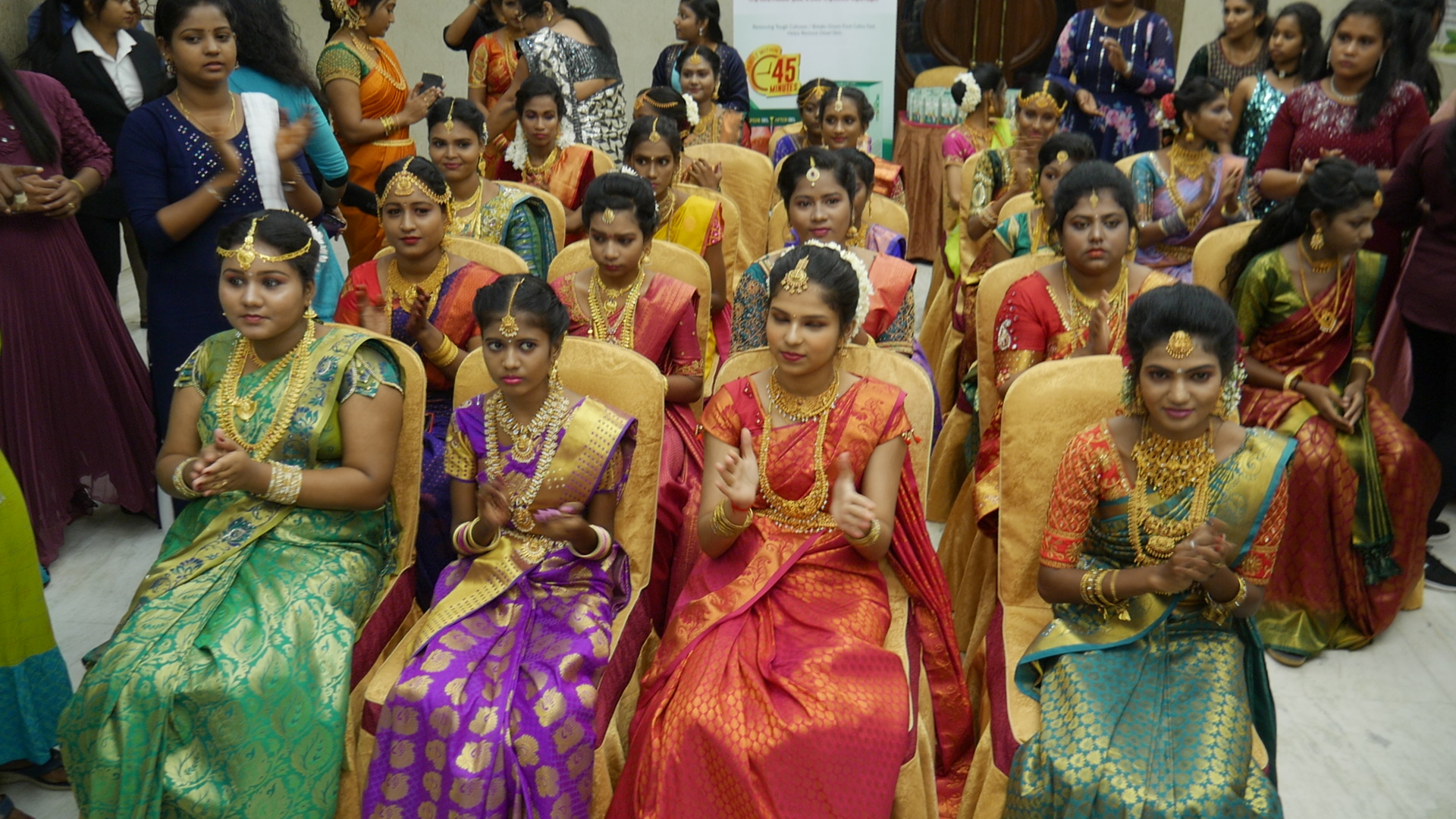 Most number of beauticians gathered together  performing Hindu bridal makeup on models in least time.