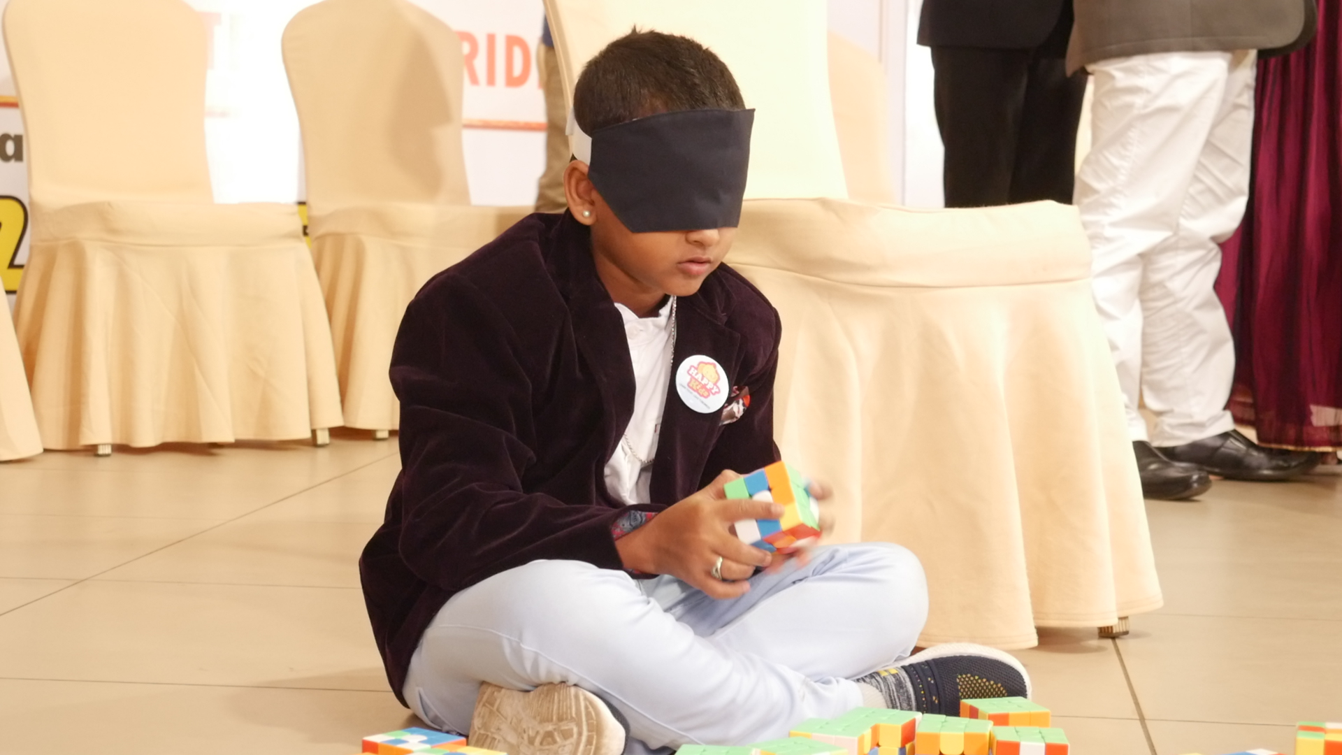 "World record by solving 81 - 3*3 Rubik’s cube and arranging them in Indian National  flag by blindfolded using Mid Brain Activation Technique in least time"
