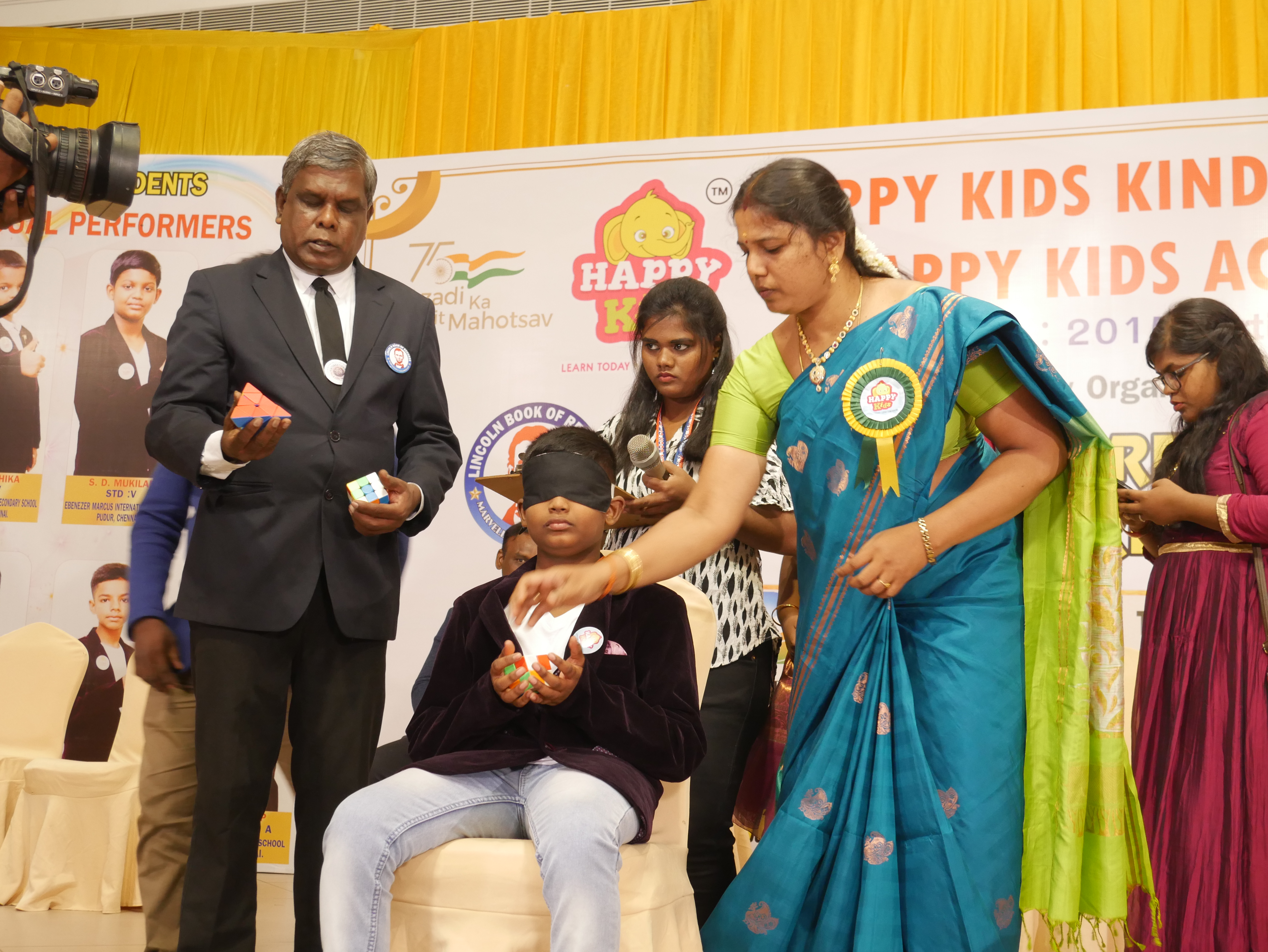 "World record by solving Pyramid, 2*2 & 3*3 Rubik’s cube by blindfolded  using Mid Brain Activation Technique in least time"